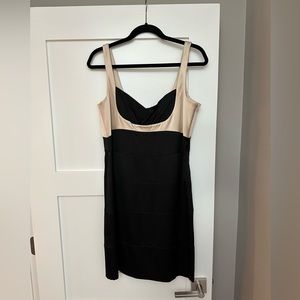 Sleek BCBG minidress, Size 12. Rouch at bust and tiered fabric in dress.